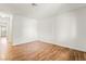 Bright bedroom features hardwood floors and neutral walls at 2898 Violet Ln # 0, Henderson, NV 89074