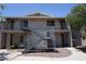 Apartment building with metal stairs and balcony and stucco exterior; unit numbers are clearly visible at 2898 Violet Ln # 0, Henderson, NV 89074