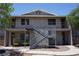 Two story condo building featuring balconies and metal stairs at 2898 Violet Ln # 0, Henderson, NV 89074