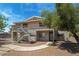 Apartment building featuring pedestrian access and landscaping on a sunny day at 2898 Violet Ln # 0, Henderson, NV 89074