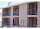 Three-story exterior of apartment complex showcasing balconies, doors, and railings at 2898 Violet Ln # 0, Henderson, NV 89074