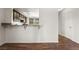 Eat-in kitchen features wood cabinets and a breakfast bar at 2898 Violet Ln # 0, Henderson, NV 89074