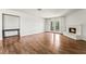 Bright living room with hardwood floors, fireplace and French doors at 2898 Violet Ln # 0, Henderson, NV 89074