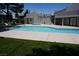 Inviting community pool with lounge chairs for relaxation at 2898 Violet Ln # 0, Henderson, NV 89074