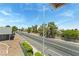 View from balcony of the wide street and surrounding landscaping at 2898 Violet Ln # 0, Henderson, NV 89074
