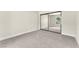 Bright bedroom offers a carpeted floor, baseboard trim, and a mirrored closet at 2964 Juniper Hills Blvd # 104, Las Vegas, NV 89142
