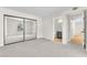 Spacious bedroom features carpeted floor, large mirror closet, and access to the bathroom at 2964 Juniper Hills Blvd # 104, Las Vegas, NV 89142