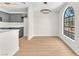 Open dining space features a large window and modern hanging light at 2964 Juniper Hills Blvd # 104, Las Vegas, NV 89142
