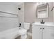 This bathroom features modern fixtures, a bathtub with shower, and a vanity at 3150 Soft Breezes Dr # 2186, Las Vegas, NV 89128