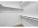 This walk-in closet has built-in shelving for optimal organization at 3150 Soft Breezes Dr # 2186, Las Vegas, NV 89128