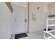 Secured condo entrances featuring a security gate and fire extinguisher at 3150 Soft Breezes Dr # 2186, Las Vegas, NV 89128