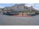 Condominium parking with covered spots and red fire hydrant near the building at 3150 Soft Breezes Dr # 2186, Las Vegas, NV 89128