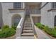 Exterior staircase leading to upper level condos with secure front doors at 3150 Soft Breezes Dr # 2186, Las Vegas, NV 89128