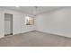 Bedroom with neutral carpet, a window, and a sliding door closet at 3151 Soaring Gulls Dr # 1179, Las Vegas, NV 89128