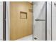 Contemporary shower with marble and wood-look tile, rainfall showerhead and built-in niche at 3151 Soaring Gulls Dr # 1179, Las Vegas, NV 89128