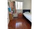 Bright bedroom with a view, showcasing natural light, a single bed, and a wooden nightstand at 4017 Edgeford Pl, Las Vegas, NV 89102