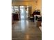 The living room has hardwood flooring and lots of natural light at 4017 Edgeford Pl, Las Vegas, NV 89102