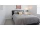 A modern bedroom with a comfortable bed, stylish pillows, and bright natural light from the window at 4200 S Valley View Blvd # 3053, Las Vegas, NV 89103