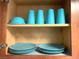 Kitchen cabinet showcasing organized dishware with cups on the upper level and plates on the lower level at 4200 S Valley View Blvd # 3053, Las Vegas, NV 89103
