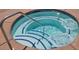 A bubbling hot tub with blue tile accents and a stainless steel grab bar at 4200 S Valley View Blvd # 3053, Las Vegas, NV 89103
