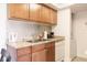 Functional kitchen features granite countertops, stainless steel appliances, and a mosaic backsplash at 4200 S Valley View Blvd # 3053, Las Vegas, NV 89103