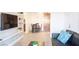 Open-concept living space with comfortable seating, dining area, and a modern kitchen at 4200 S Valley View Blvd # 3053, Las Vegas, NV 89103