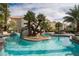 Lagoon style pool with palm trees and rock waterfall feature, great for relaxation at 4200 S Valley View Blvd # 3053, Las Vegas, NV 89103