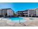 Community pool and hot tub with ample seating, a great place to relax and unwind at 4200 S Valley View Blvd # 3053, Las Vegas, NV 89103