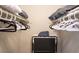 Neatly organized walk-in closet with ample hanging space and a convenient folding rack at 4200 S Valley View Blvd # 3053, Las Vegas, NV 89103