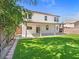 Spacious backyard with artificial grass, perfect for outdoor activities and entertainment at 4905 Apache Valley Ave, Las Vegas, NV 89131