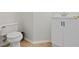 Powder room featuring white vanity, toilet, neutral walls, and tile flooring at 4905 Apache Valley Ave, Las Vegas, NV 89131