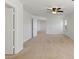 Spacious carpeted bedroom featuring a ceiling fan and natural light from the window at 4905 Apache Valley Ave, Las Vegas, NV 89131