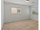 Bedroom with carpet and natural light from two windows at 4905 Apache Valley Ave, Las Vegas, NV 89131
