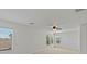 Open concept bonus room with neutral paint, carpet, and natural light at 4905 Apache Valley Ave, Las Vegas, NV 89131