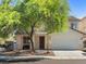 Charming two-story home featuring a well-maintained front yard and a convenient two-car garage at 4905 Apache Valley Ave, Las Vegas, NV 89131