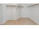Walk-in closet with carpet and ample shelving provides organized storage at 4905 Apache Valley Ave, Las Vegas, NV 89131