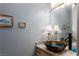Stylish bathroom featuring a vessel sink and modern fixtures at 522 Via Ventana Dr, Mesquite, NV 89027