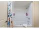Clean bathtub and shower featuring colorful shower curtain and white fixtures at 522 Via Ventana Dr, Mesquite, NV 89027