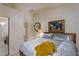 Serene bedroom with vaulted ceiling, soft lighting, and plush bedding at 522 Via Ventana Dr, Mesquite, NV 89027