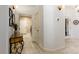 Well-lit hallway with neutral tones and decorative furnishings at 522 Via Ventana Dr, Mesquite, NV 89027