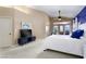 Spacious main bedroom with a tv, ceiling fan, and access to the balcony at 522 Via Ventana Dr, Mesquite, NV 89027