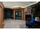 Enclosed patio featuring a stone fireplace and comfortable seating at 522 Via Ventana Dr, Mesquite, NV 89027