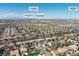 Aerial view of neighborhood near Allegiant Stadium and the Las Vegas Strip, with surrounding homes at 5225 Villa Dante Ave, Las Vegas, NV 89141