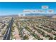 Aerial view of neighborhood near Smith's and Southern Highlands Golf Course, with surrounding homes at 5225 Villa Dante Ave, Las Vegas, NV 89141