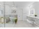 Stylish bathroom featuring a walk-in shower, soaking tub and modern vanity at 5225 Villa Dante Ave, Las Vegas, NV 89141
