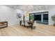 Elegant dining room featuring a coffered ceiling and sliding doors to the backyard at 5225 Villa Dante Ave, Las Vegas, NV 89141