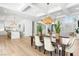 Open concept living area with dining, kitchen, and living room at 5225 Villa Dante Ave, Las Vegas, NV 89141