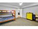 Neutral tone bedroom with bunk beds and modern drawers at 544 N Fogg St, Las Vegas, NV 89110