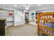 A well-organized bedroom with custom shelving and cozy bunk beds at 544 N Fogg St, Las Vegas, NV 89110