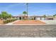 Charming single-story home featuring an attached three-car garage and desert landscaping at 544 N Fogg St, Las Vegas, NV 89110